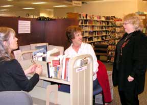 volunteers at the library