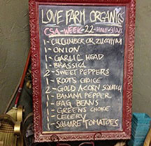 Love Farm Organics chalkboard sign