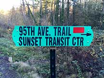 Trailhead sign that reads "95th Ave. Trail, Sunset Transit Center."