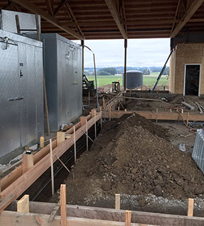 Large walk-in coolers were installed as part of the Market and processing building. Concrete was being poured on March 1.