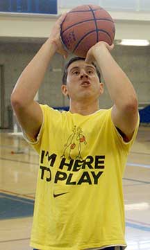 Basketball player shooting hoops