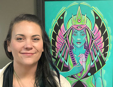 Stephanie Littlebird Fogel and one of her paintings