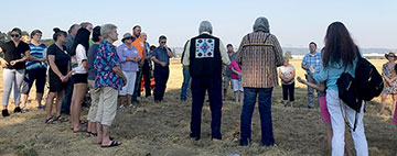 Two Nez Perce elders performed a blessing for the land and the people who were buried there.