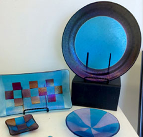 Fused glass pieces by Eileen Millsap