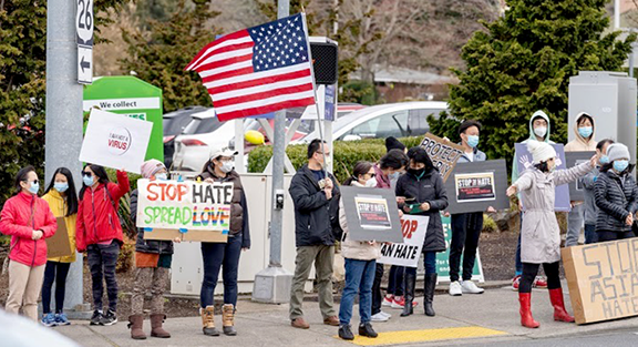 Asian American neighbors gathered last month to raise awareness about the damage that hate can cause. Jenny Hu shared a story that ended, "Can you imagine every phone conversation between Asian kids and their parents recently? It used to be, “Hey how’s work? How was your vacation?” Now every conversation is “Promise you will be extremely vigilant when walking on the street. Actually how about not walking on the street." 