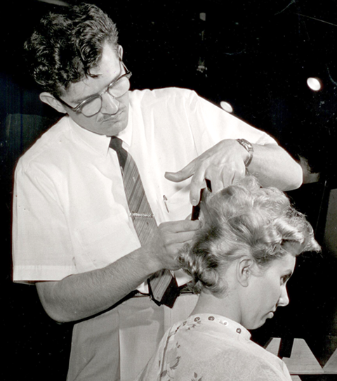 Mr. James cutting hair.