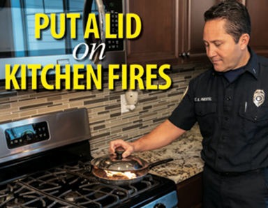 put a lid on kitchen fires - firefighter puts lid on flaming pan