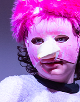 kids camp child in pink feathered mask costume