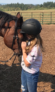 child and horse