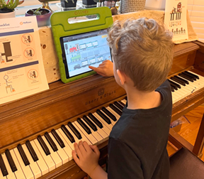 child at piano