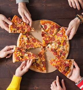 hands grabbing pizza slices